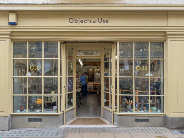 The grey-green shopfront of Objects of Use on Market Street, Oxford