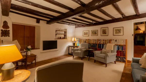 well cottage living room lamplight